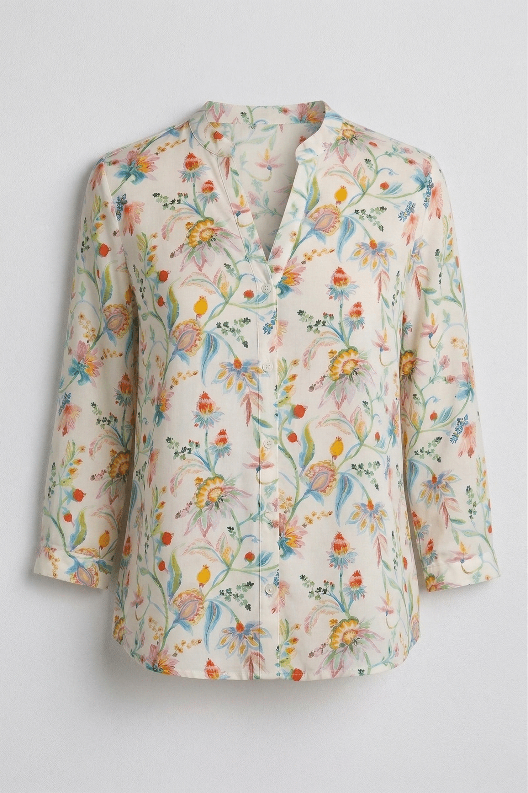 Floral patterned blouse on a light gray background