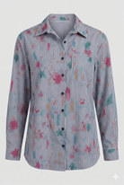 Striped shirt with colorful abstract patterns on a white background