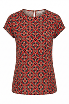 Red and black patterned shirt on a white background