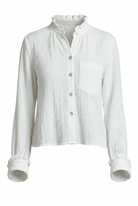 White textured shirt on a white background