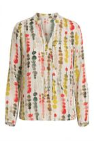 Colorful patterned blouse on a white background