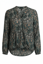 Long-sleeve shirt with a floral pattern on a white background