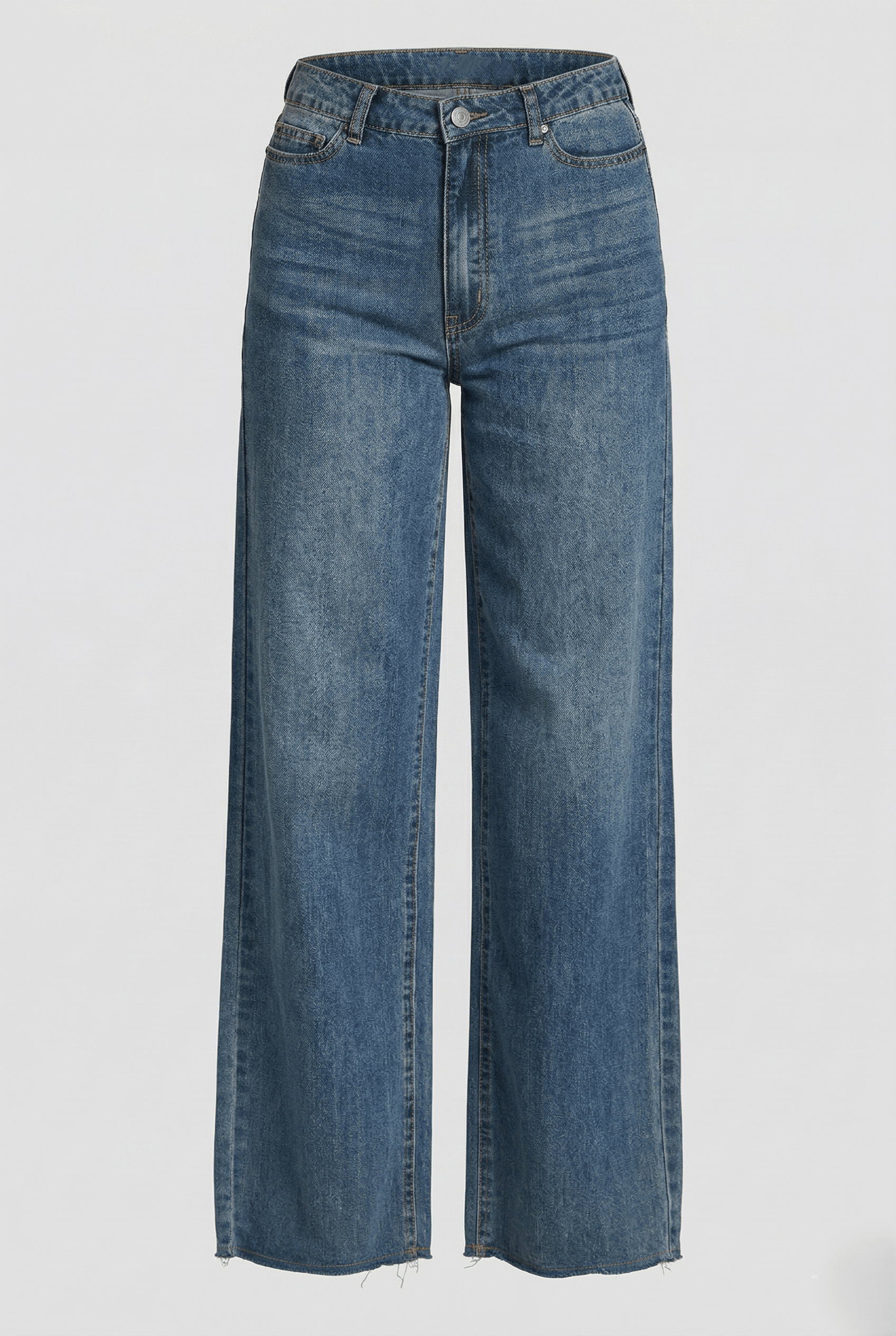 Blue jeans on a light gray background