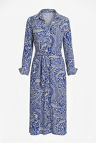 Blue patterned dress on a white background