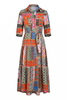 Colorful patterned dress on a white background