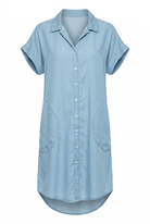 Light blue denim shirt with short sleeves on a white background