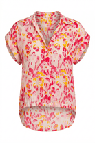 Pink and yellow patterned blouse