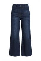 Pair of dark blue jeans on a white background
